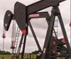 Crude prices hit 5-month lows as glut fears weigh