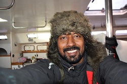 This picture was taken sometime in the third month of the voyage in the Southern Ocean (Antarctic), where the eemperature was about 4 degrees. I was wearing a Russian ushanka hat that I had bought in a flee market in Goa in 2011.
