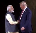 PM Modi, President Trump pat each other at 'Howdy Modi' event