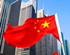 China lowers 2014 GDP growth to 7.3% from 7.4%