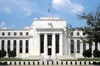Federal Reserve ends bond buying; says US economy recovering