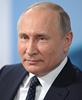 Putin basks in landslide poll victory, opposition cries foul